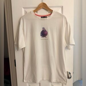 White T-Shirt with Purple Pigeon Graphic